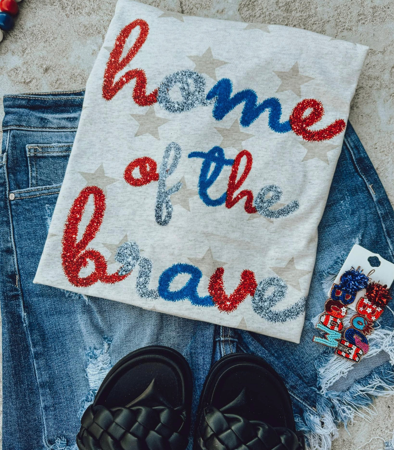 Graphic T - Home of the brave ….