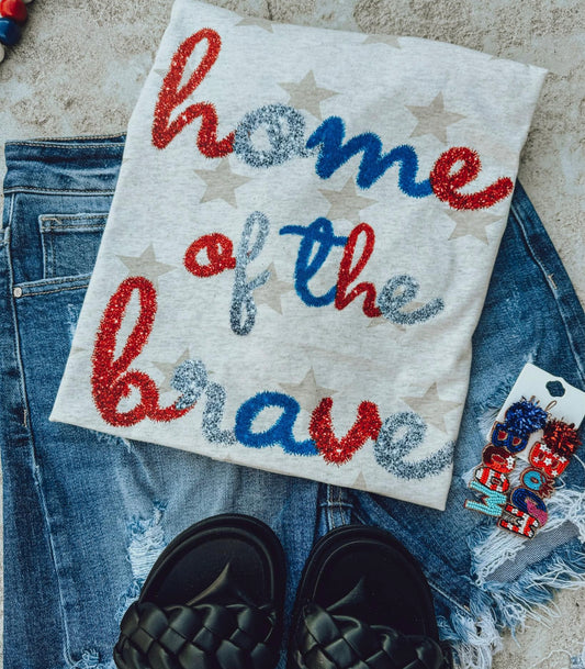 Graphic T - Home of the brave ….